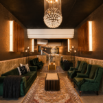 1 on Daphny Orion Apartments luxury lobby in Wendywood, Sandton, featuring modern fully furnished apartment living, elegant lounge seating, warm lighting and premium interior finishes.