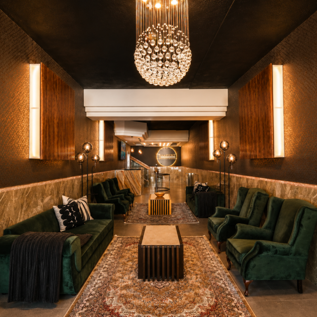 1 on Daphny Orion Apartments luxury lobby in Wendywood, Sandton, featuring modern fully furnished apartment living, elegant lounge seating, warm lighting and premium interior finishes.