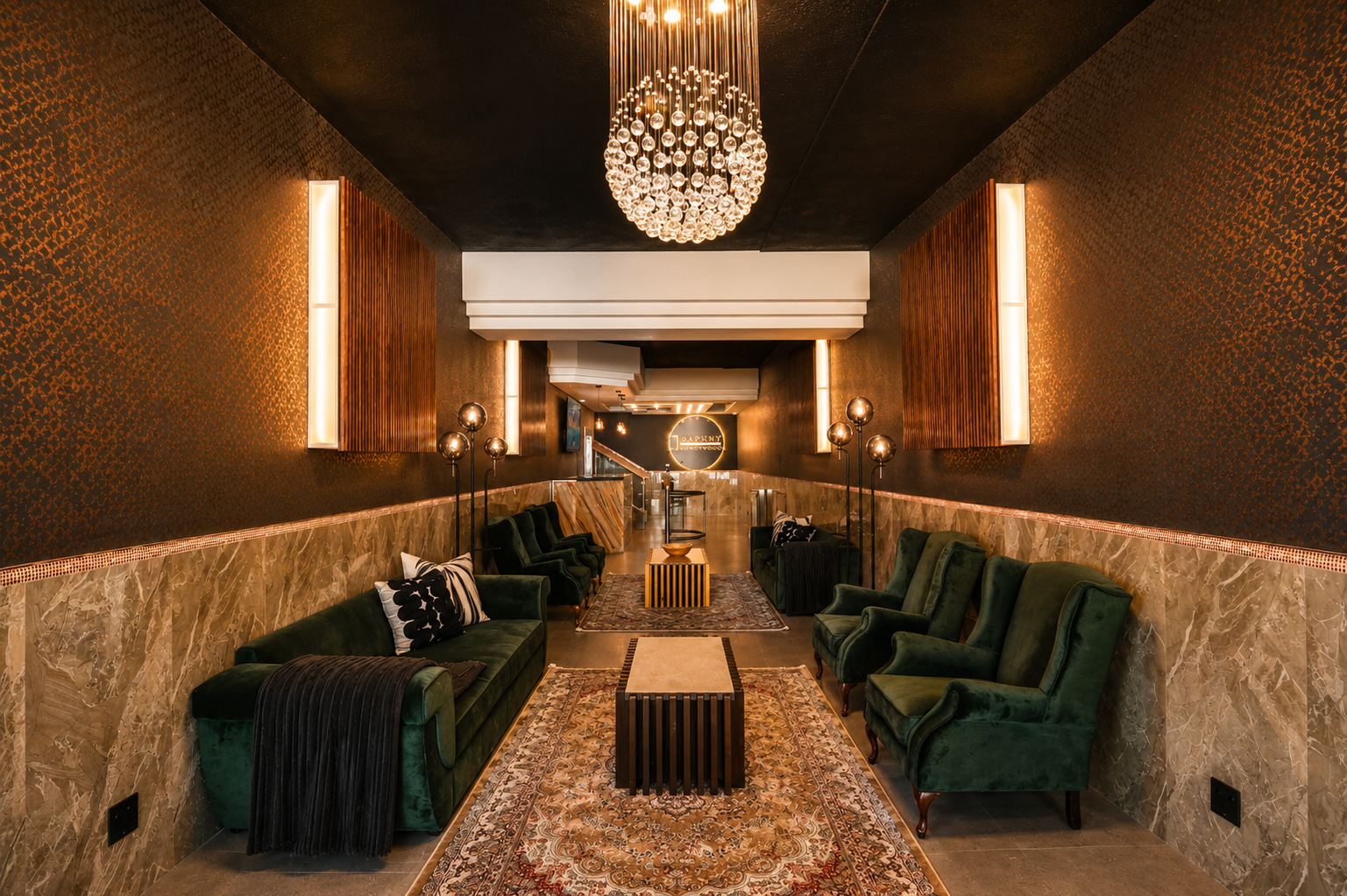 1 on Daphny Orion Apartments luxury lobby in Wendywood, Sandton, featuring modern fully furnished apartment living, elegant lounge seating, warm lighting and premium interior finishes.